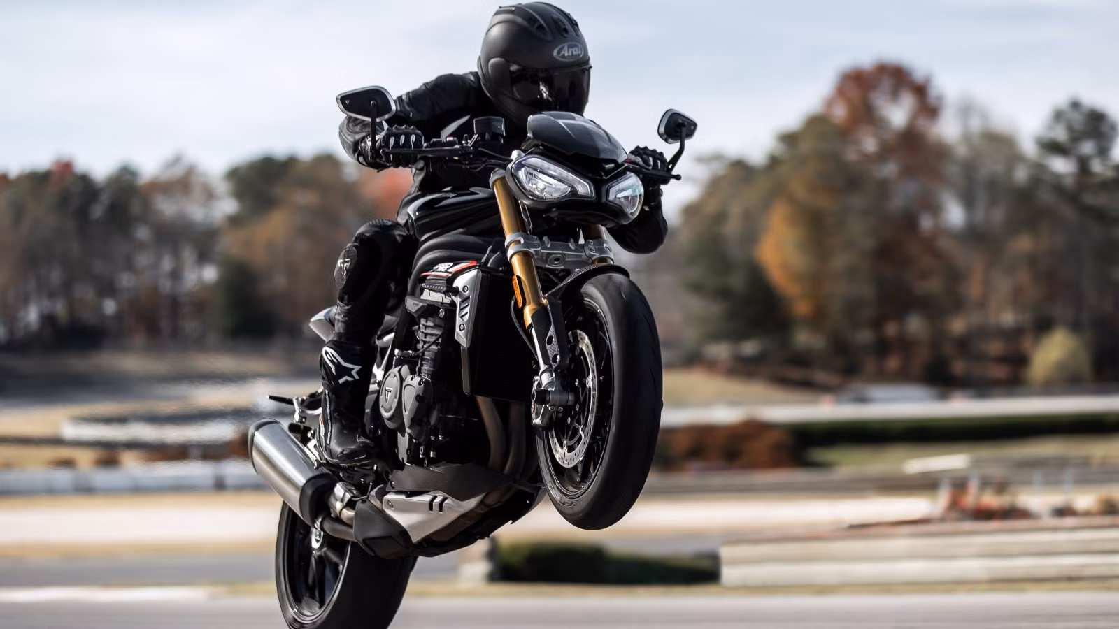 Sport-touring motorcycle showing front tyre prominently.